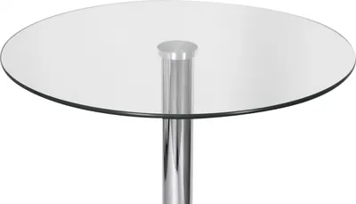 A close-up view of a round glass-top table with a chrome pedestal base.