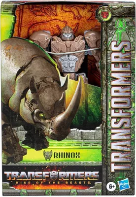 The image shows the packaging of a Transformers Rise of the Beasts Voyager Class Rhinox action figure.