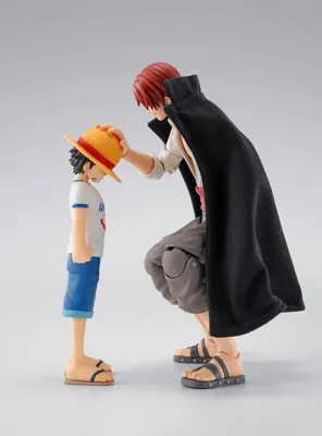 Two anime figures, one adult and one child, interacting.