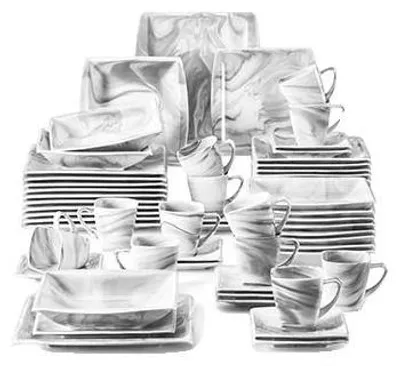 A collection of dinnerware with a marble pattern.