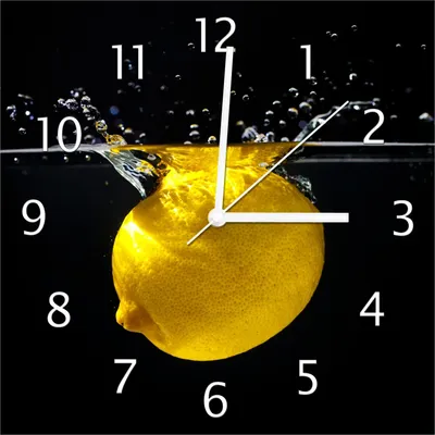 Produktbild von Wallario Design Wanduhr Zitrone im Wasser - Frisches Obst für die Küche aus Echtglas, Größe 30 x 30 cm