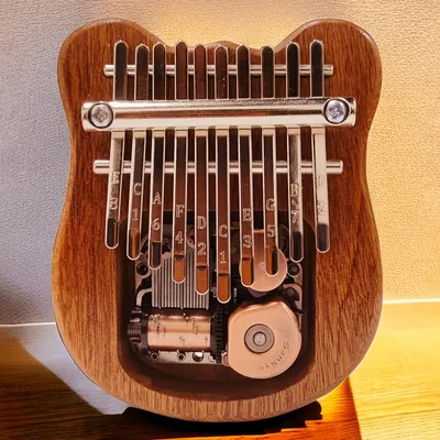 Produktbild von Kalimba Mini-Daumenklavier, 10 Tasten, tragbares Musikinstrument, Cartoon, niedliche Spieluhr, Geschenk für Erwachsene, Anfänger, interessant, Party, Reisen, Sapeli-Holz