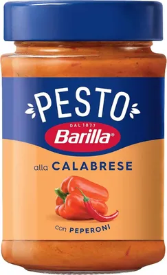 A jar of Barilla Pesto alla Calabrese with peppers and chili peppers.