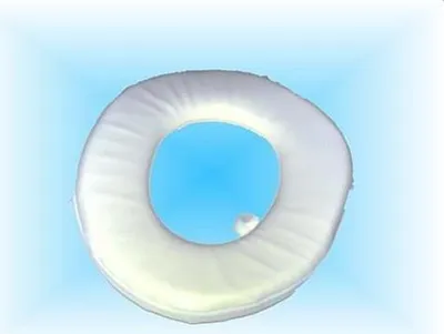 A white, ring-shaped product with a blue center against a gradient blue and white background.