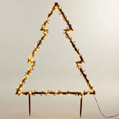 A lit-up, stylized Christmas tree decoration made of metal and lights.