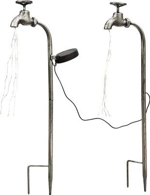 Two decorative metal garden stakes shaped like faucets with LED lights cascading from them.