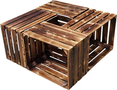 A set of four wooden crates arranged to form a coffee table.