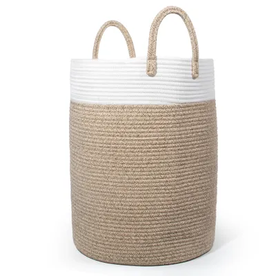 A tall, cylindrical woven basket with handles, divided into a brown lower section and a white upper section.