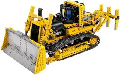 Produktbild von LEGO 8275 Motorized Bulldozer LEGO Thema: LEGO Technic, Anzahl Anleitungen: 3, Veröffentlicht in: 2007, Verpackungsmaße (lxbxh): 65.2 x 48 x 9.6 cm, Altersberatung: 11+, Zahl: 8275-1, UPC: 673419091688, Gewicht: 2.885 KG, Anzahl Teile: 1382, EAN: 5702014500068