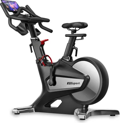 A studio shot of a black and silver exercise bike against a white background.