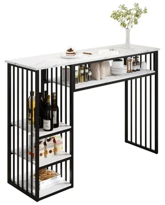 Immagine prodotto di Tavolino da bar - Tavolino da appoggio - 140 x 40 x 105 cm - Piano in MDF con effetto marmo - 3 ripiani - Struttura in metallo nero - Colori: bianco e nero