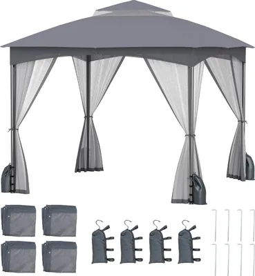 A gray gazebo with mosquito netting and accessories laid out below.