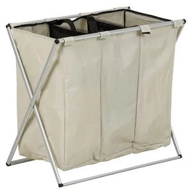 A beige laundry hamper with a metal frame.