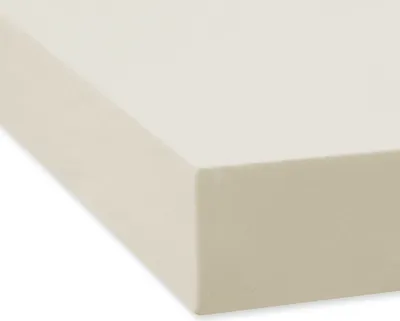 A close-up, angled view of a cream-colored fitted sheet.