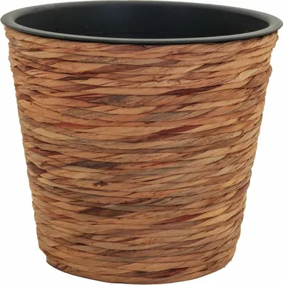 A close-up of a woven plant pot.