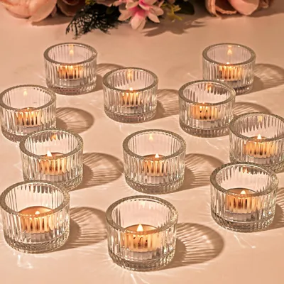 Zdjęcie produktu dla Zestaw 12 przezroczystych, szklanych świeczników na świeczki typu tealight, idealnych do dekoracji