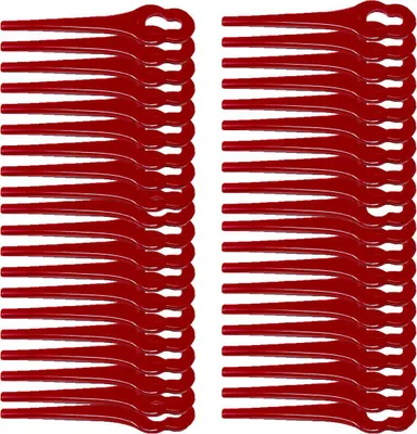 A stack of red trimmer blades.