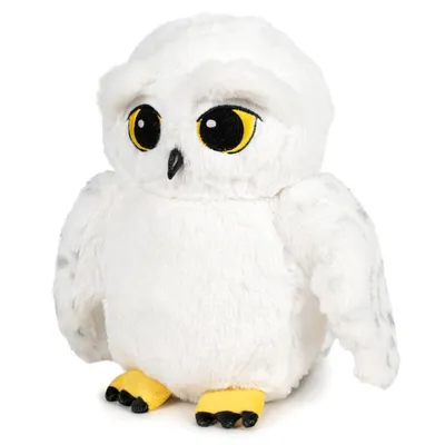 A plush toy owl on a white background.