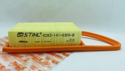 A Stihl air filter is shown on a white and light gray background.