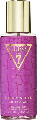 A close-up studio shot of a purple fragrance mist bottle with a gold cap.