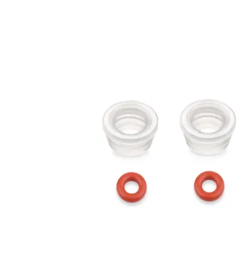 Two clear plastic ring-shaped adapters and two red ring-shaped seals are arranged in two rows on a white background.
