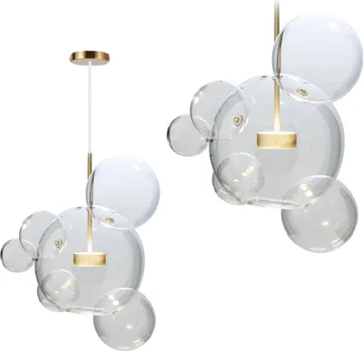 Two bubble-shaped glass pendant lights with gold accents, displayed against a white background.