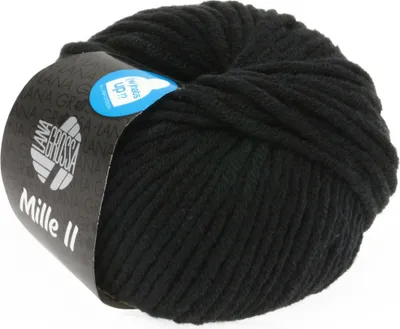 A ball of black yarn with a label wrapped around it.