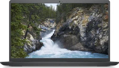 A laptop with a scenic waterfall wallpaper displayed on its screen.