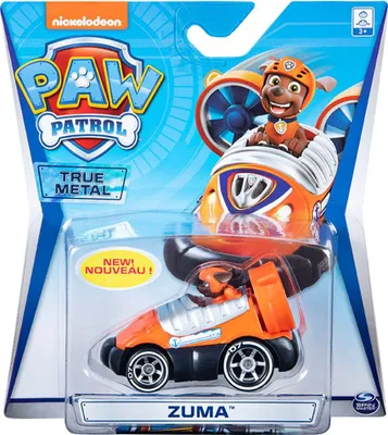 A toy vehicle, specifically a Paw Patrol True Metal vehicle featuring the character Zuma, is displayed in its retail packaging.
