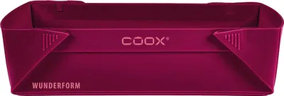 A product shot of a dark red silicone baking mold.