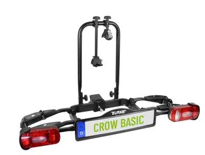 A black bicycle rack with red lights and a license plate is shown against a white background.