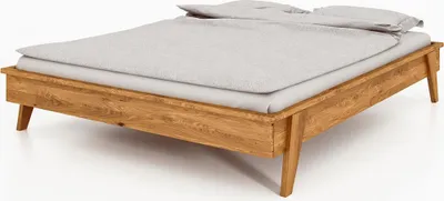 Produktbild von Bett Jetro 3 aus Wildeiche massiv 160x200 cm ohne Kopfteil mit Holzbeinen