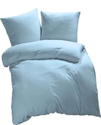 A light blue duvet cover and two pillowcases are neatly arranged on a white background.