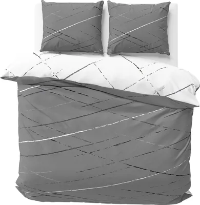 A bedding set with two pillows and a duvet cover, laid out on a white surface.