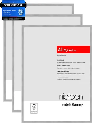 Three silver-colored picture frames are stacked on a white background.