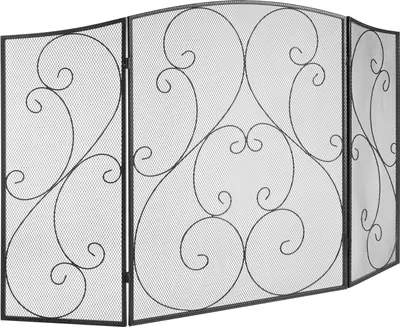 A black metal fireplace screen with ornate scrollwork.