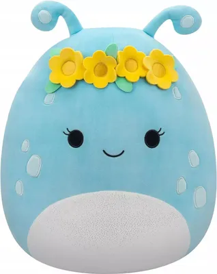 A blue plush toy with yellow flowers on its head, set against a white background.