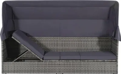 A grey rattan garden bed with a dark grey canopy and cushions, shown from a top-down view with one section of the cushion reclined.