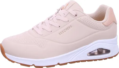 A single beige Skechers sneaker is shown from a side angle against a white background.