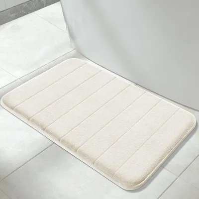 Immagine prodotto di Tappetino da bagno Unyqoos®: morbido, assorbente, 80 x 50 cm. Realizzato con schiuma viscoelastica, superficie in microfibra, base antiscivolo in PVC, lavabile in lavatrice, colore neutro
