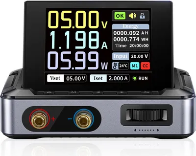 A digital power supply unit with a display showing voltage, current, and power.