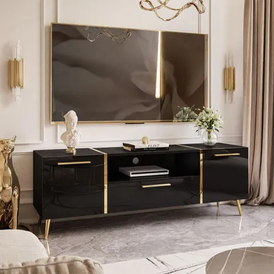 A modern living room with a black glossy TV stand and a large television.