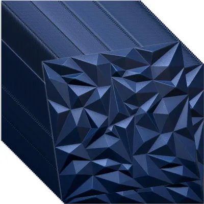 A stack of dark blue 3D wall panels with a geometric, faceted design.