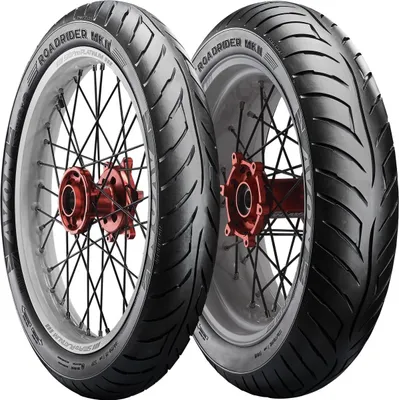 Two motorcycle tires mounted on rims, presented against a white background.