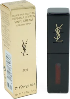 A lipstick tube and its packaging are shown against a white background.