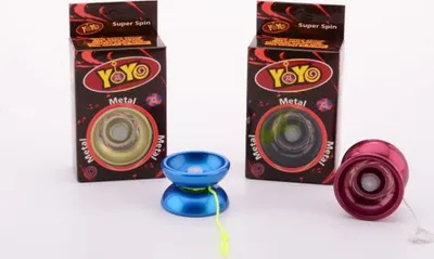 Imagen del producto de Jo - un "jo-jo" con un eje metálico, que viene en una caja