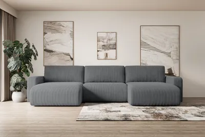 A modern living room with a large U-shaped sectional sofa.