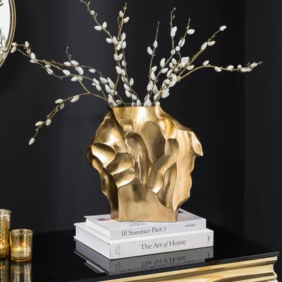 Produktbild von riess-ambiente Edle Vase LIQUID 25cm gold Metall Hammerschlag-Design Unikat