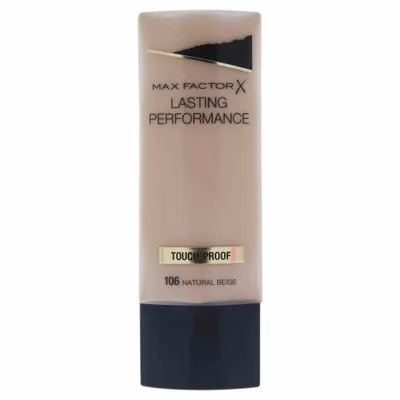 A product shot of a foundation bottle against a white background.