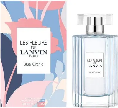 A perfume bottle and its packaging are displayed side-by-side against a white background.